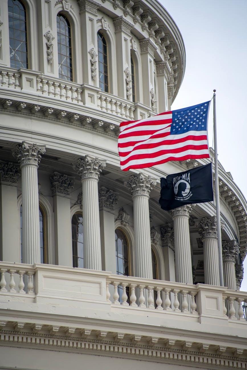 us capitol building with american flag