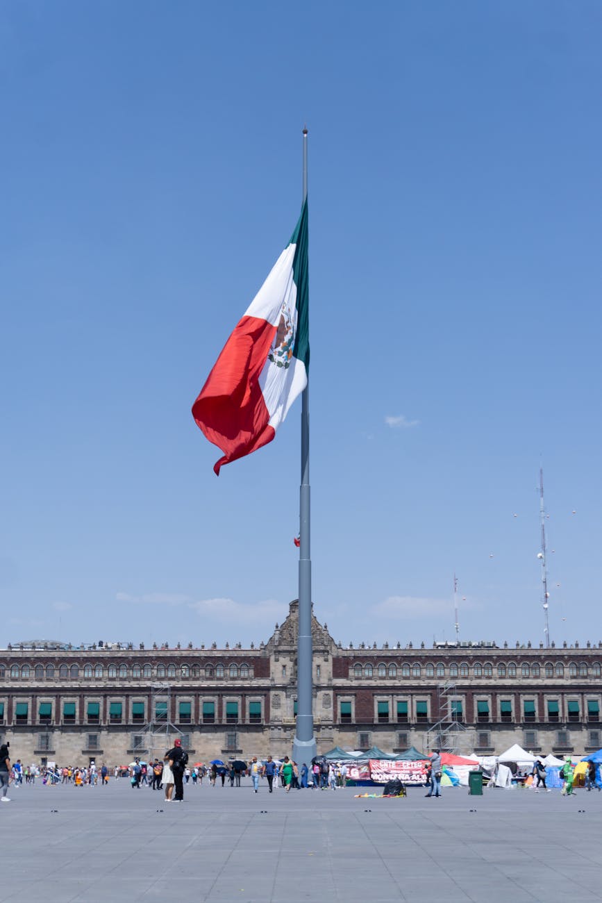 mexican flag at zocalo in mexico city