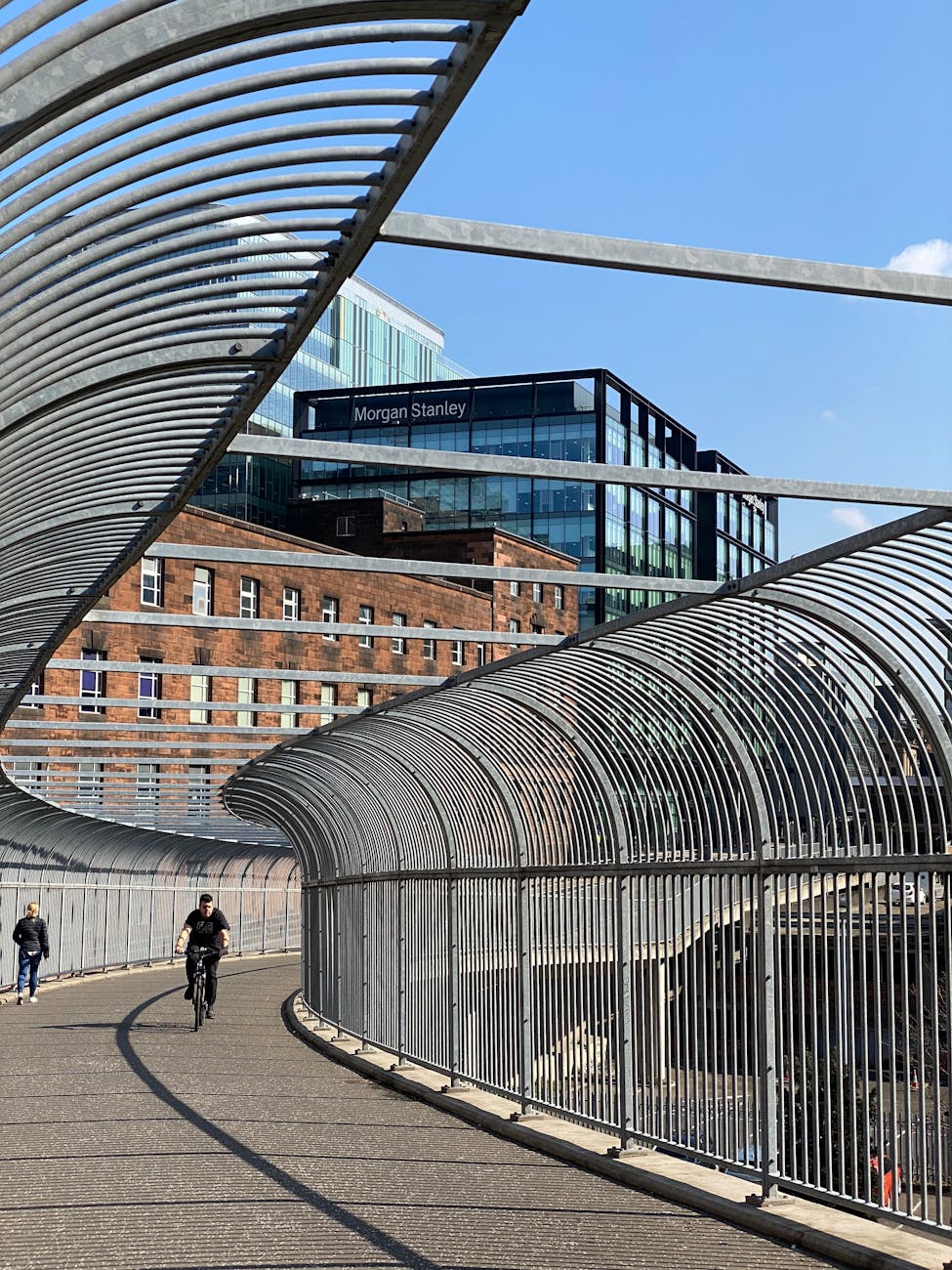 clear sky over footbridge in city
