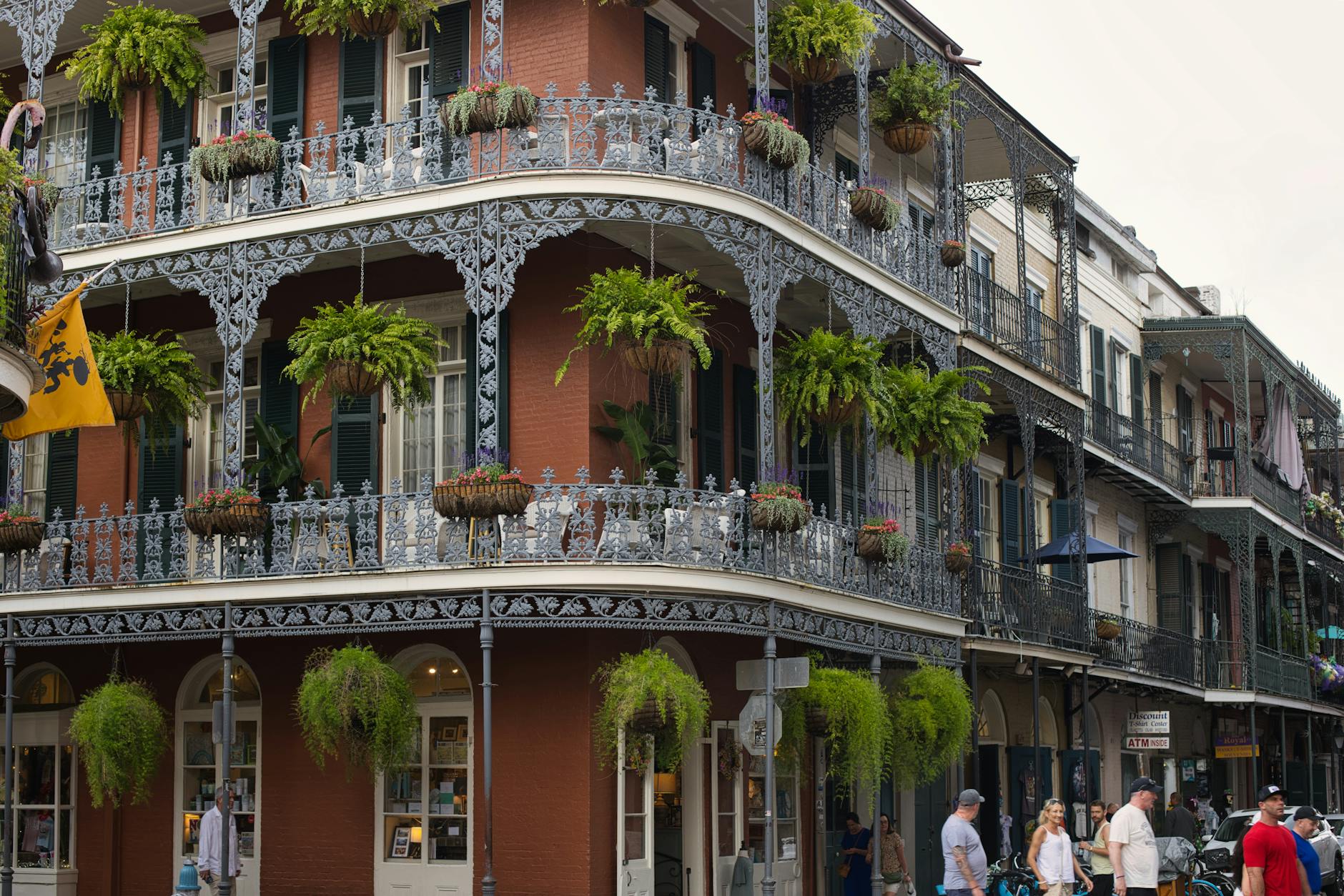 pexels-photo-25003129 building with plants hanging over balconies