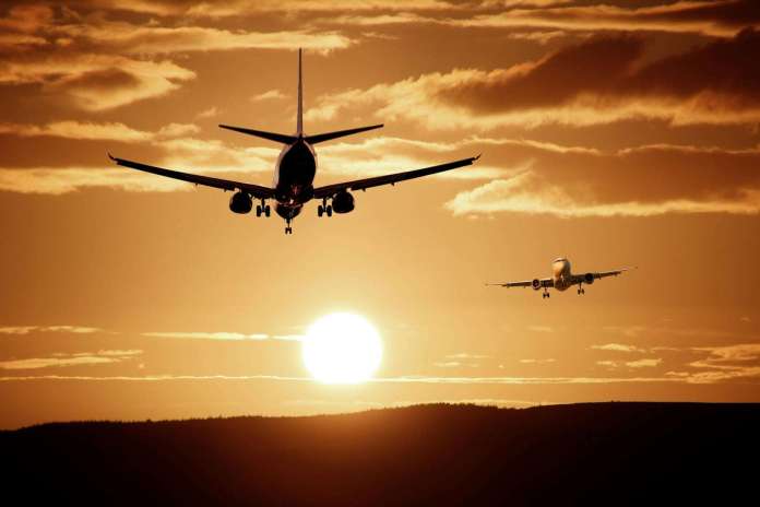 aircraft-landing-reach-injection-47044 silhouette of airplanes