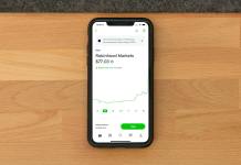 white samsung android smartphone on brown wooden table