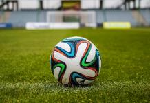 adidas soccer ball on grass open field